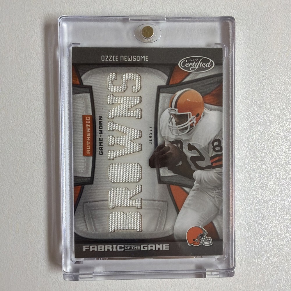 2009 Certified – Fabric of the Game Ozzie Newsome #108 Die-Cut Team Nickname /25
