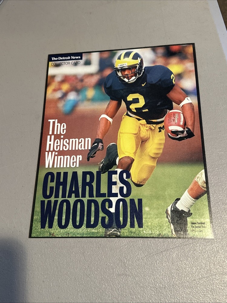 The Detroit news collector card the Heisman winner Charles Woodson. 10 1/2 X 13