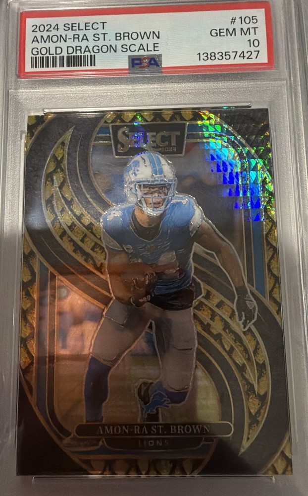 2024 Panini Select – Premier Level Amon-Ra St. Brown #105 Gold Dragon Scale…