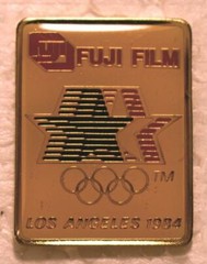1984 Los Angeles Olympics Fuji Film Collectors Pin – Stars In Motion 1-1/8″x7/8″