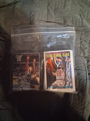 small stack of sports cards. mixed brands mostly basketball.
