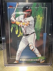 2024 Topps Finest Ronald Acuña Jr. baseball card encased in a protective sleeve.