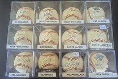 12 Signed Baseballs In Cubes Autographed Good Names