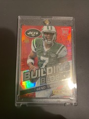 2013 Panini Monster Box – Prizm Building Blocks Geno Smith #7 Red Prizm /99 (RC)