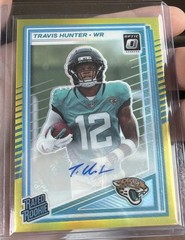 2025 Panini Optic Travis Hunter /99 Rated Rookie Auto