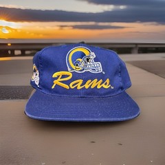 Vintage St. Louis Rams snapback cap features “St. Louis” embroidered