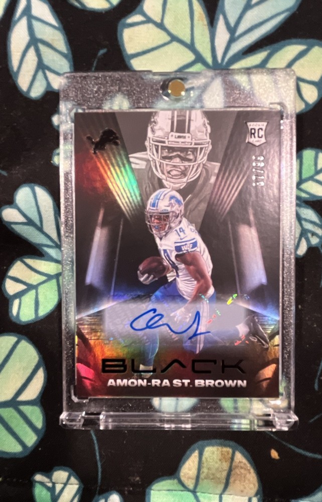 2021 Panini Black – Rookies Amon-Ra St. Brown #134 Autographs /99 (AU, RC)